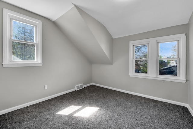8127 Continental Ave, Warren, MI 48089 - bonus room featuring visible vents, vaulted ceiling, carpet, and plenty of natural light