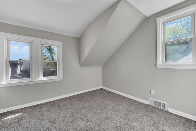 8127 Continental Ave, Warren, MI 48089 - bonus room with baseboards, visible vents, carpet, and vaulted ceiling