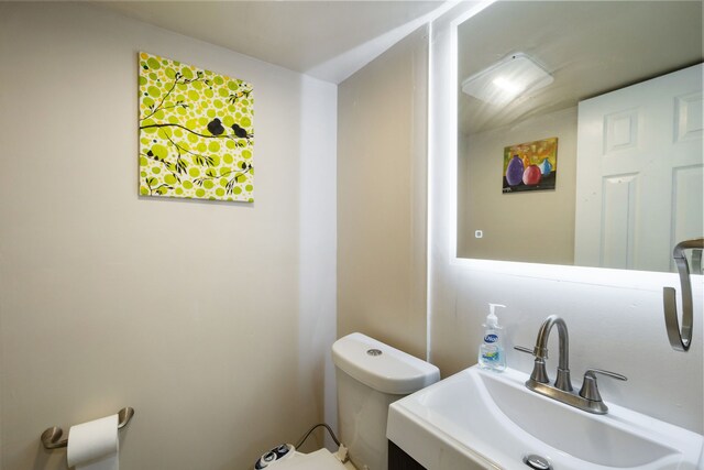 bathroom with a sink and toilet