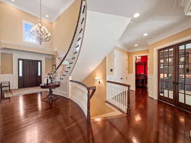 810 Highwood Dr, Bloomfield Hills, MI 48304 - foyer featuring wood finished floors, french doors, a decorative wall, and recessed lighting