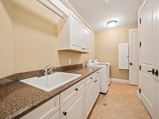 810 Highwood Dr, Bloomfield Hills, MI 48304 - clothes washing area with a sink, cabinet space, light tile patterned flooring, baseboards, and washer and dryer