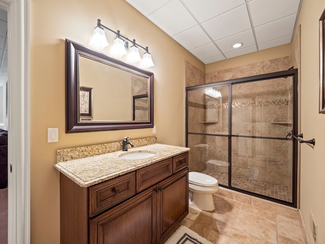 810 Highwood Dr, Bloomfield Hills, MI 48304 - full bath featuring a paneled ceiling, a shower stall, toilet, and vanity