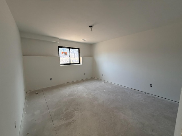 412 Sabine Dr Unit 11, Muskegon, MI 49442 - unfurnished room featuring concrete flooring