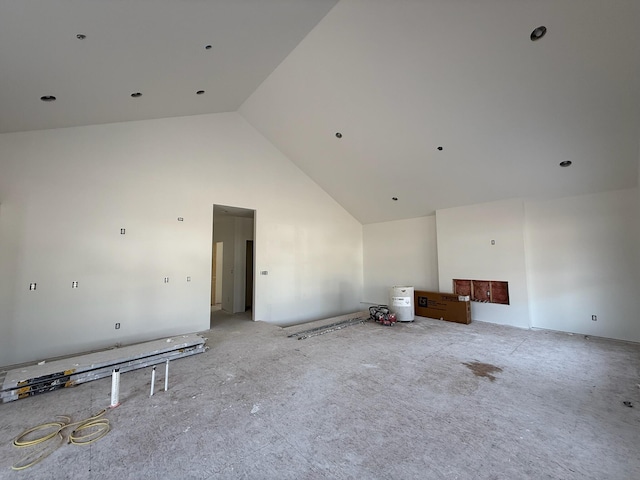 412 Sabine Dr Unit 11, Muskegon, MI 49442 - unfurnished living room featuring high vaulted ceiling