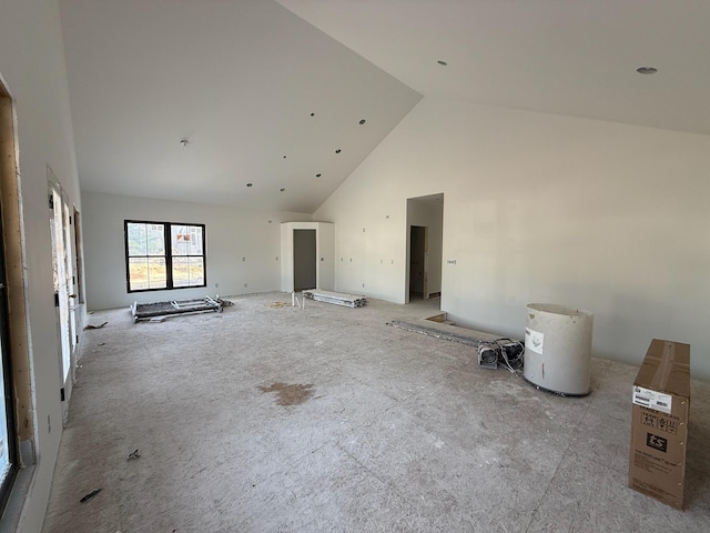 412 Sabine Dr Unit 11, Muskegon, MI 49442 - unfurnished living room with high vaulted ceiling