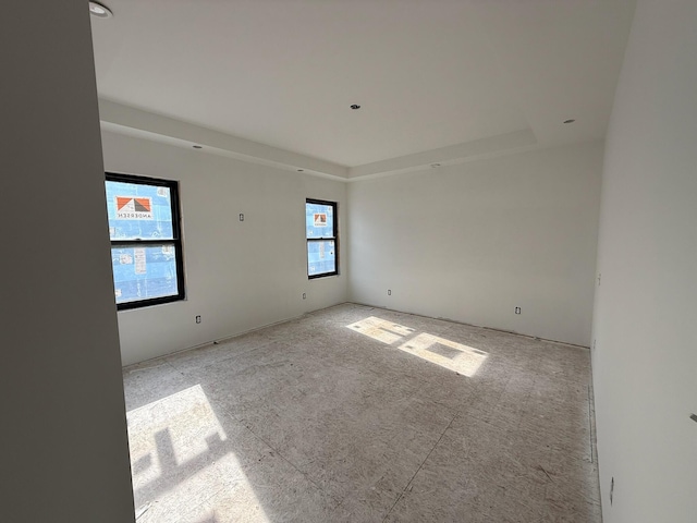 412 Sabine Dr Unit 11, Muskegon, MI 49442 - unfurnished room with a raised ceiling