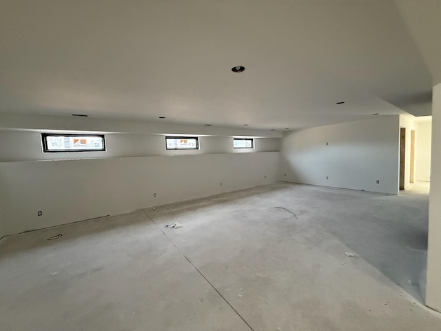 412 Sabine Dr Unit 11, Muskegon, MI 49442 - spare room featuring unfinished concrete flooring