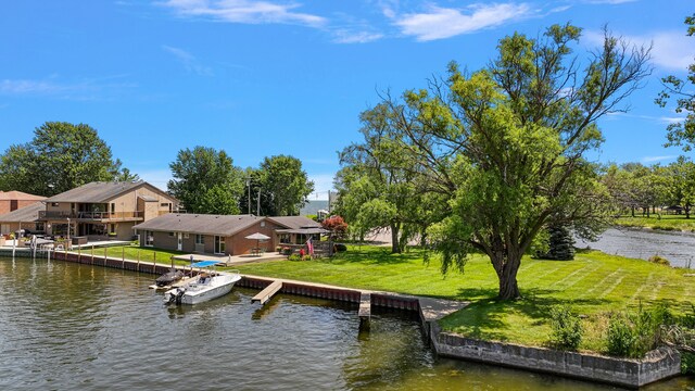 37337 Lakeshore Dr, Harrison Township, MI 48045 - view of dock featuring a lawn and a water view