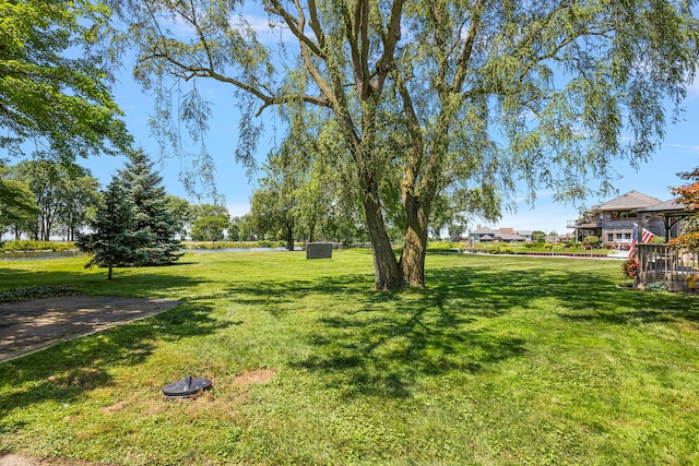 37337 Lakeshore Dr, Harrison Township, MI 48045 - view of yard with a gazebo and a water view