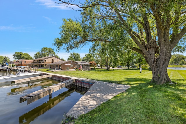 37337 Lakeshore Dr, Harrison Township, MI 48045 - dock area featuring a lawn and a water view