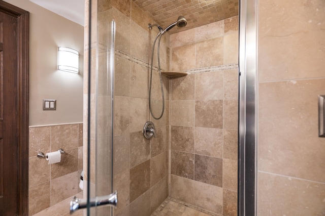 full bathroom with a shower stall