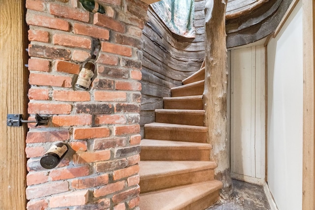 stairway with baseboards