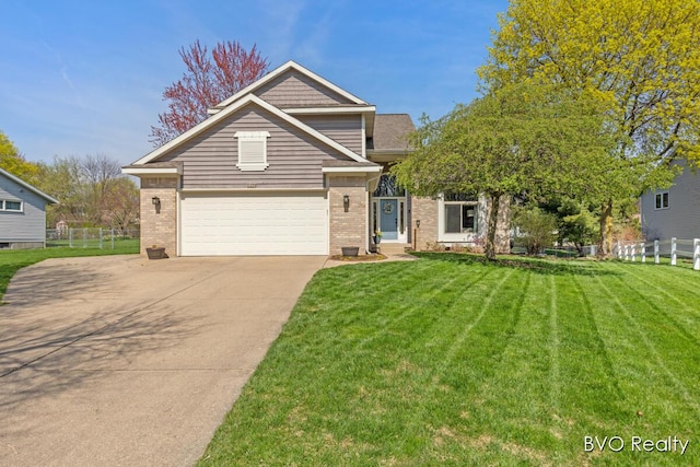 traditional home featuring brick siding, fence, and driveway