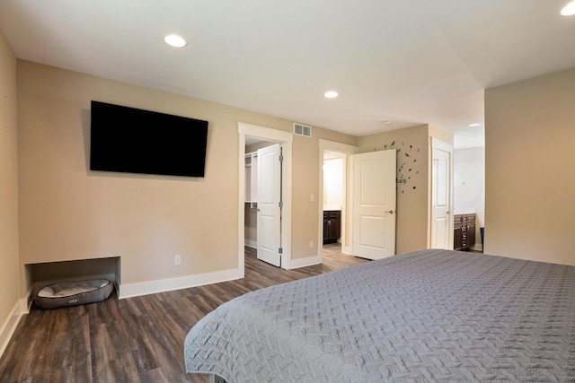 bedroom featuring baseboards, recessed lighting, wood finished floors, and visible vents