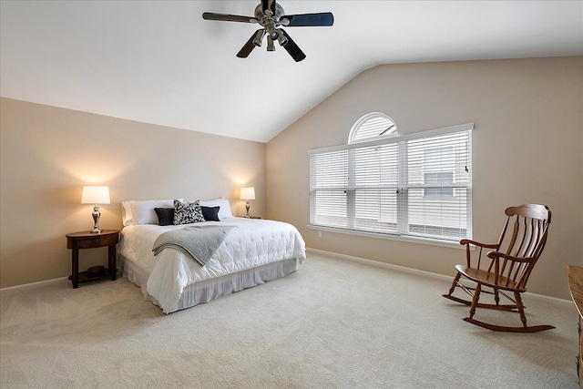 bedroom with carpet floors, a ceiling fan, baseboards, and vaulted ceiling