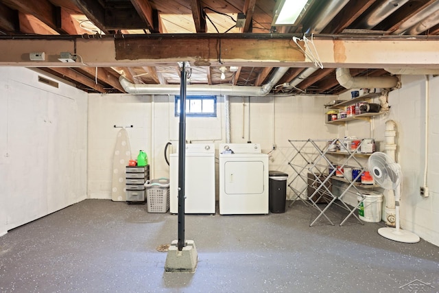 basement featuring separate washer and dryer