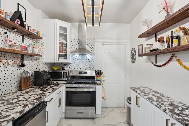 kitchen featuring open shelves, marble finish floor, wall chimney exhaust hood, white cabinets, and stainless steel appliances