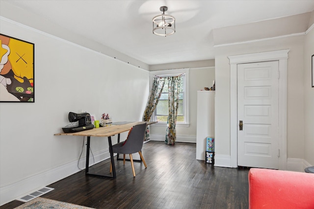 office space with visible vents, baseboards, and dark wood-type flooring