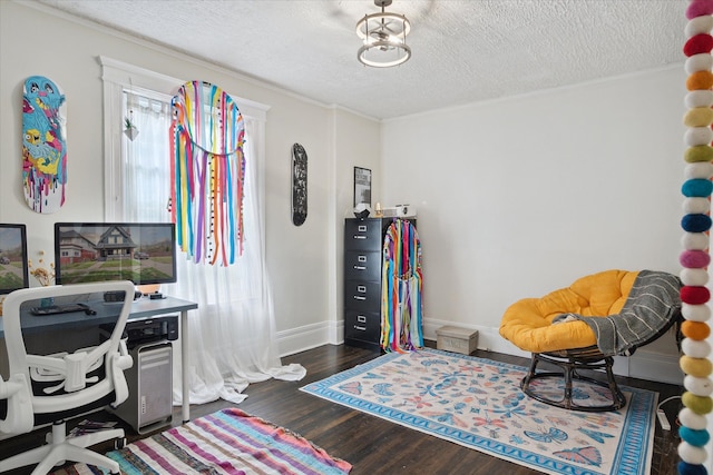 office featuring baseboards, ornamental molding, dark wood finished floors, and a textured ceiling