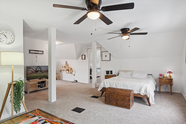 bedroom with a ceiling fan, visible vents, baseboards, lofted ceiling, and carpet flooring