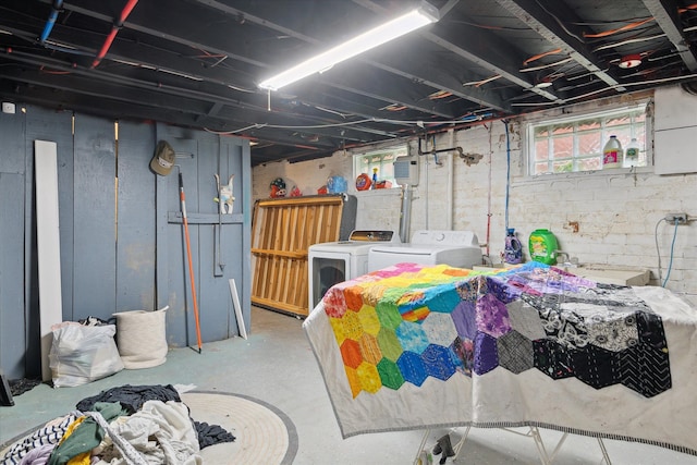 basement featuring separate washer and dryer