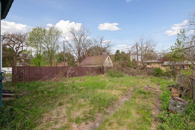 view of yard featuring fence