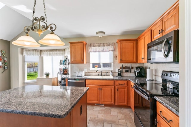 1355 Ridge View Ct, Grand Blanc, MI 48439 - kitchen with black electric range, stone finish floor, plenty of natural light, and dishwasher