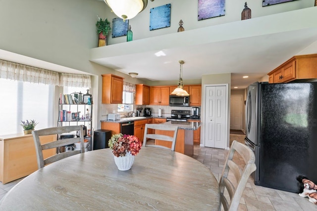 1355 Ridge View Ct, Grand Blanc, MI 48439 - dining area featuring plenty of natural light and stone tile floors