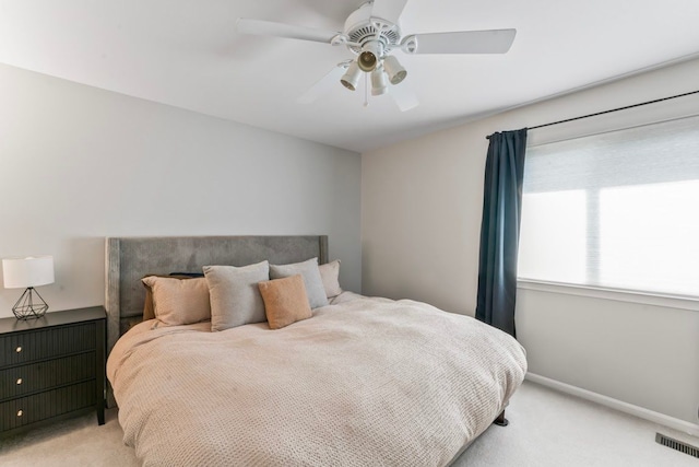 1355 Ridge View Ct, Grand Blanc, MI 48439 - bedroom featuring light colored carpet, baseboards, ceiling fan, and visible vents