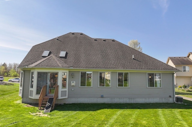 1355 Ridge View Ct, Grand Blanc, MI 48439 - rear view of property featuring a lawn, roof with shingles, cooling unit, and entry steps