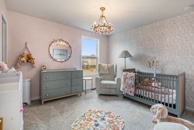 2670 Ironton Dr, Commerce Twp, MI 48382 - bedroom with wallpapered walls, a notable chandelier, a nursery area, and baseboards
