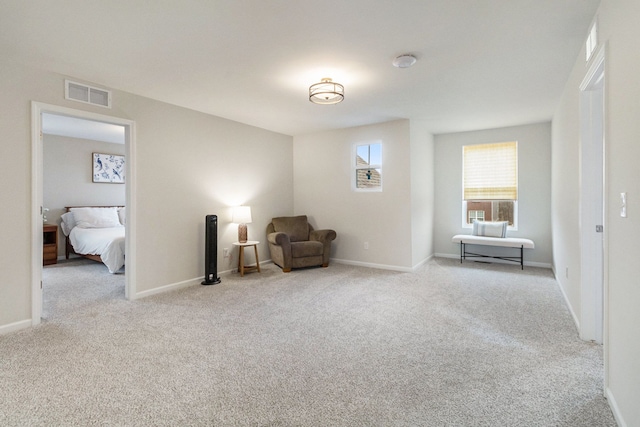 2670 Ironton Dr, Commerce Twp, MI 48382 - sitting room featuring baseboards, visible vents, and carpet
