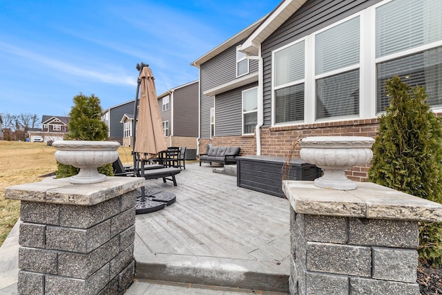 2670 Ironton Dr, Commerce Twp, MI 48382 - view of patio with an outdoor living space and a wooden deck
