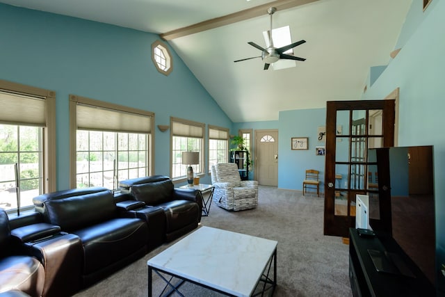 carpeted living room with french doors, high vaulted ceiling, ceiling fan, and beam ceiling