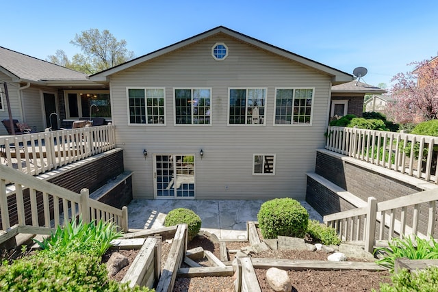 back of property with a patio area