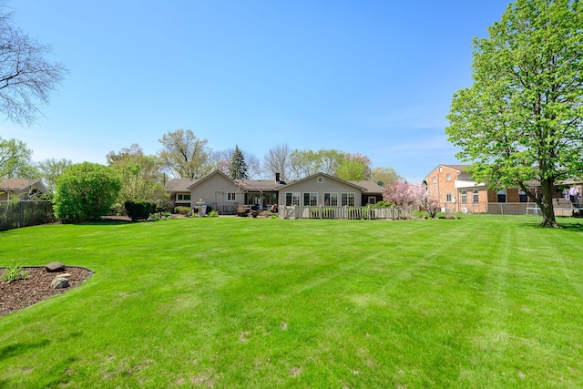 view of yard featuring fence