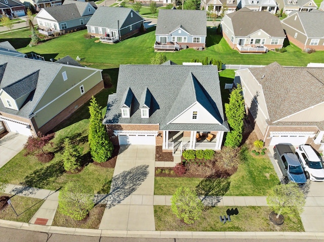 drone / aerial view with a residential view