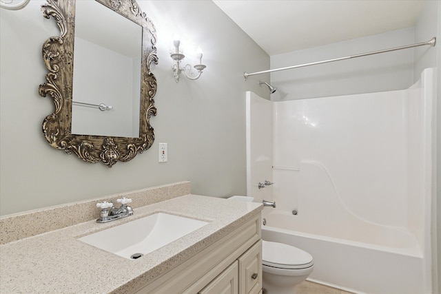 full bathroom with toilet, shower / bathing tub combination, and vanity