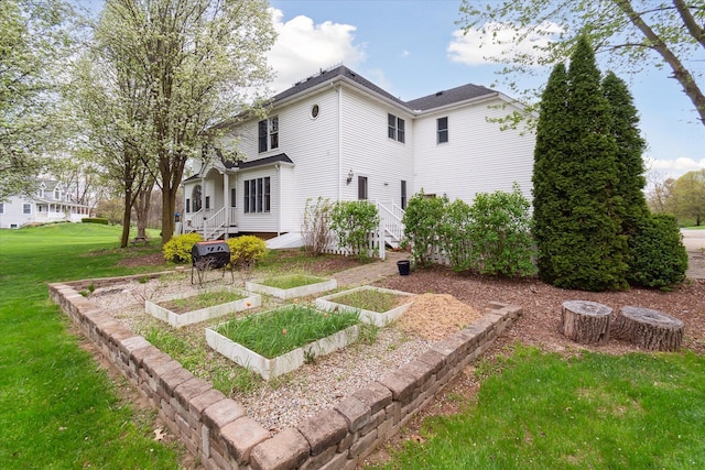 9730 Woodbend Dr, Saline, MI 48176 - rear view of property with a yard