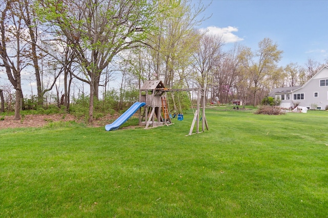 view of play area featuring a lawn
