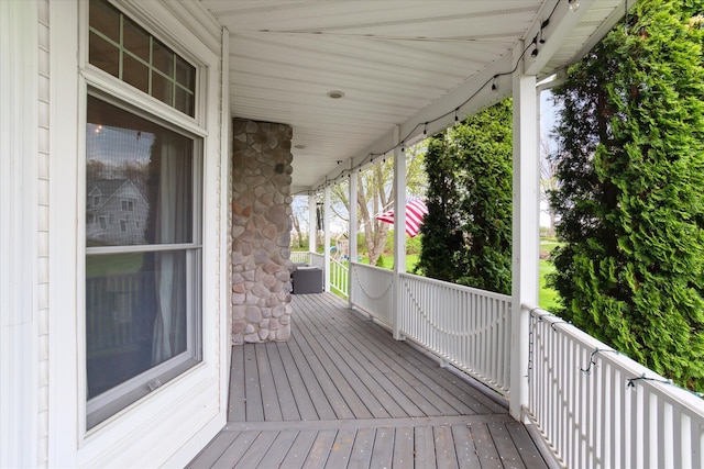 wooden terrace with covered porch