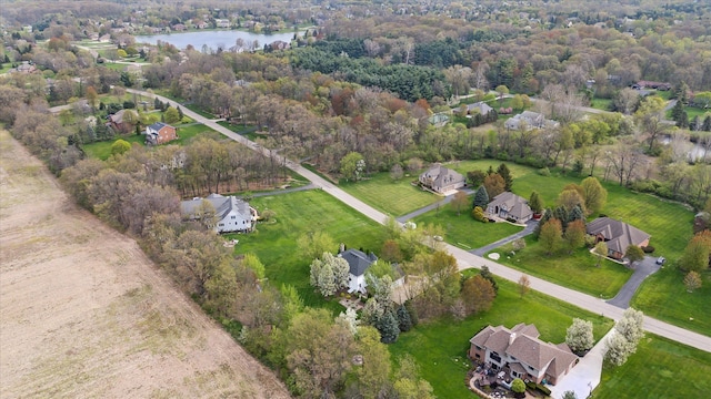 birds eye view of property featuring a residential view and a water view