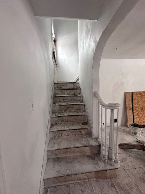 stairs with arched walkways