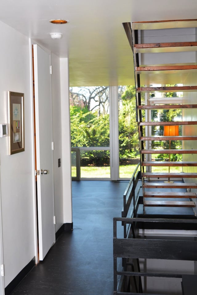 stairs featuring baseboards