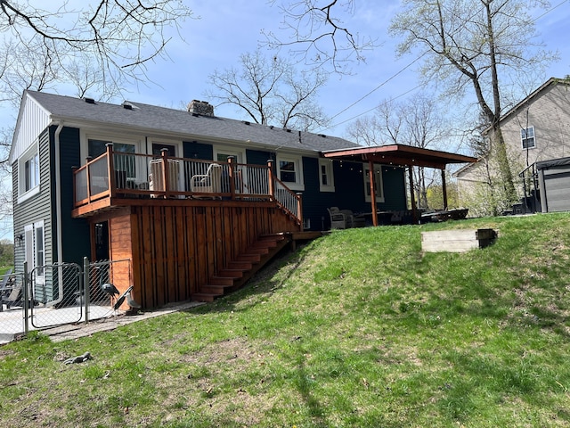 back of property featuring fence, a chimney, stairs, a gate, and a lawn