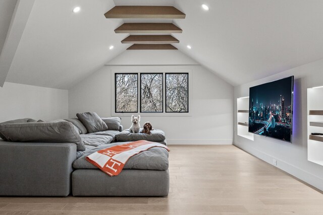 living room with recessed lighting, baseboards, vaulted ceiling with beams, and wood finished floors