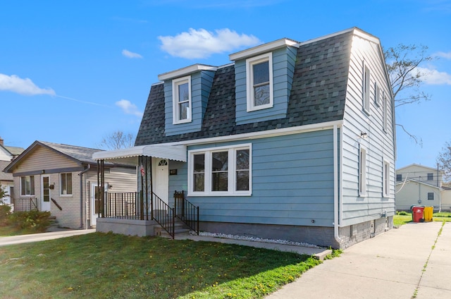 23040 Shakespeare Ave, Eastpointe, MI 48021 - view of front of house featuring a shingled roof and a front yard