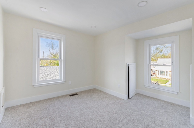 23040 Shakespeare Ave, Eastpointe, MI 48021 - unfurnished room featuring visible vents, light carpet, and baseboards