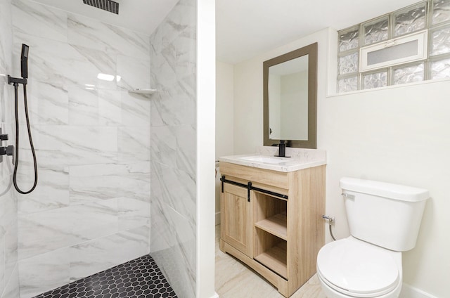 23040 Shakespeare Ave, Eastpointe, MI 48021 - bathroom featuring visible vents, a marble finish shower, toilet, and vanity