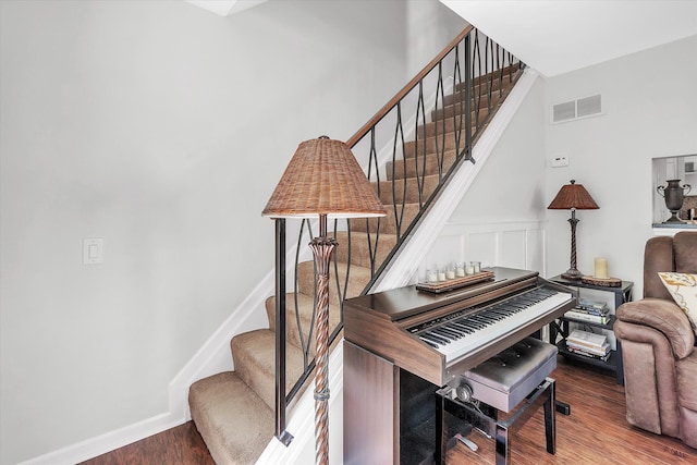 2993 Maplewood, Lake Orion, MI 48360 - stairway with visible vents, baseboards, and wood finished floors